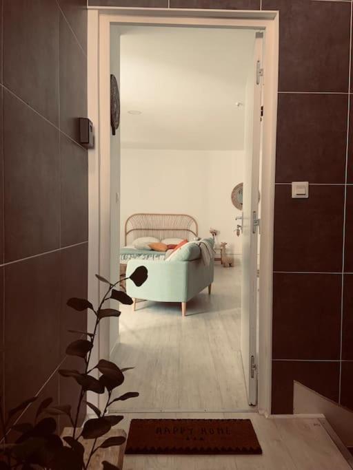 Posteľ alebo postele v izbe v ubytovaní Studio Girafe, style bohème et atypique, Curistes