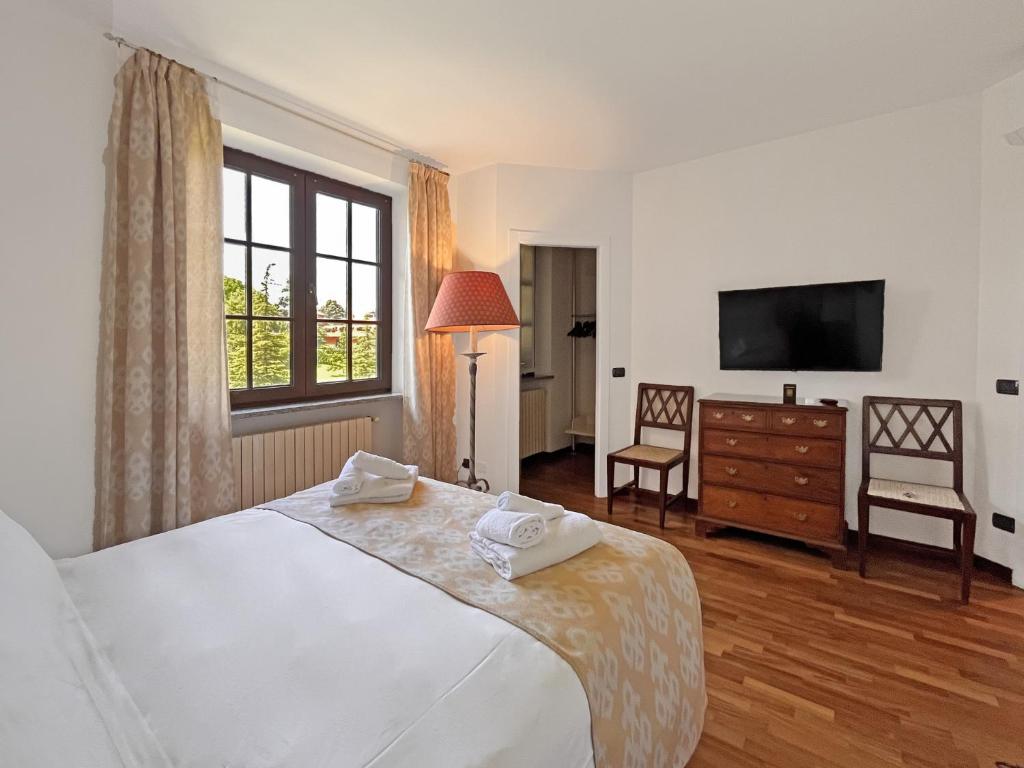 A bed or beds in a room at Golf Club Margara