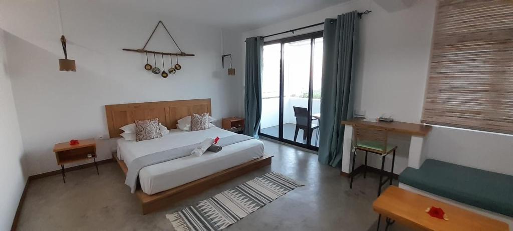 Postel nebo postele na pokoji v ubytování Villa Ti Zil