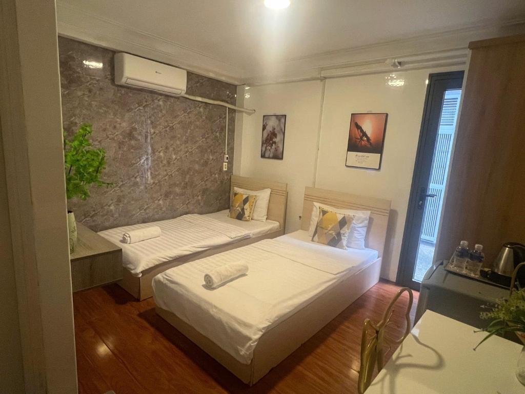 Posteľ alebo postele v izbe v ubytovaní Jasmine Hotel