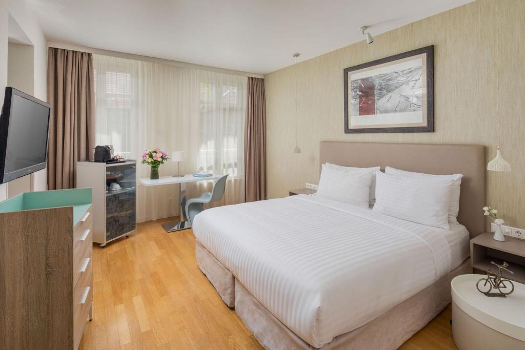 Posteľ alebo postele v izbe v ubytovaní Casati Hotel - Adults Only