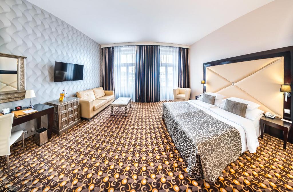Postel nebo postele na pokoji v ubytování Grandior Hotel Prague