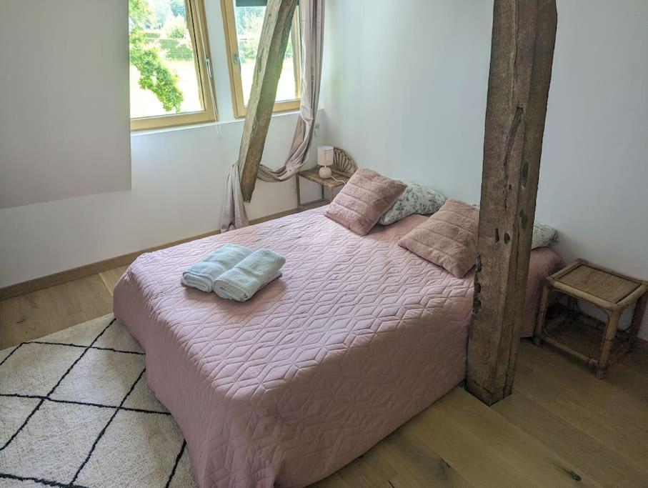 Ένα ή περισσότερα κρεβάτια σε δωμάτιο στο Maison proche Pont l'Eveque Deauville Honfleur