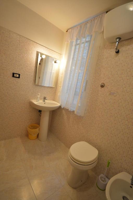 Koupelna v ubytování Hotel Alexis