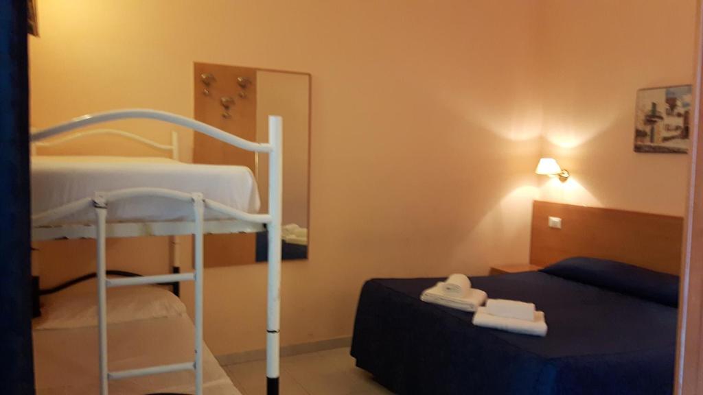 Uma cama ou camas num quarto em Palma