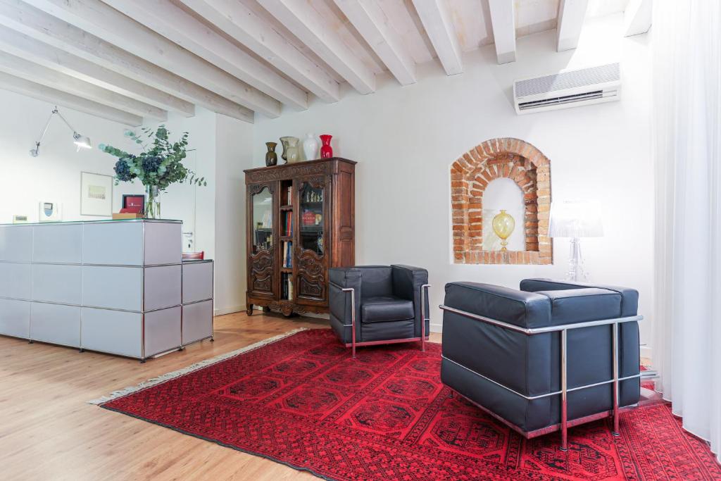 Posezení v ubytování Relais Santa Corona