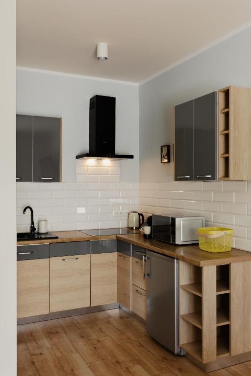Kuchyňa alebo kuchynka v ubytovaní Pająkówka Apartament I