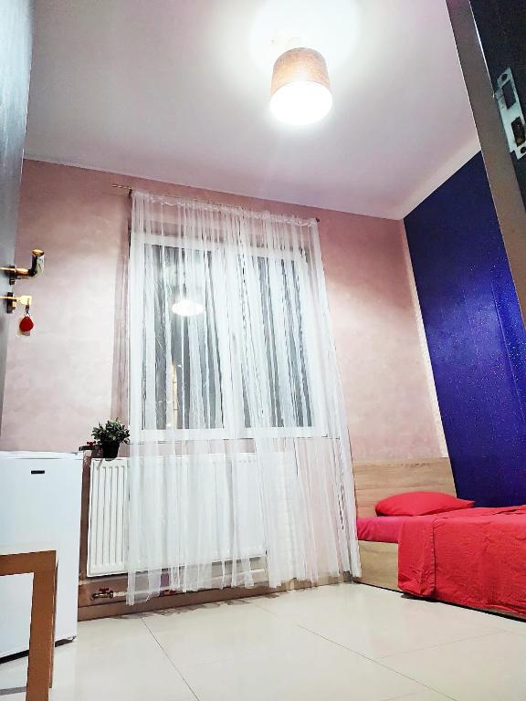 Postel nebo postele na pokoji v ubytování Old town Bucharest- Shared Apartment