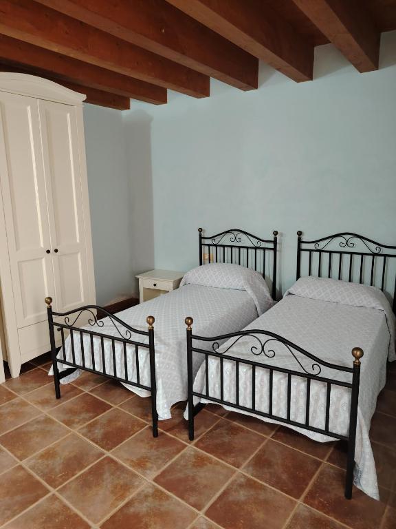 Postel nebo postele na pokoji v ubytování Albergo diffuso Sa Costa Ittireddu