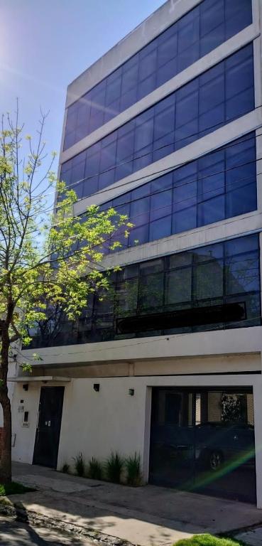 an office building with a lot of windows at Tigre Center in Tigre