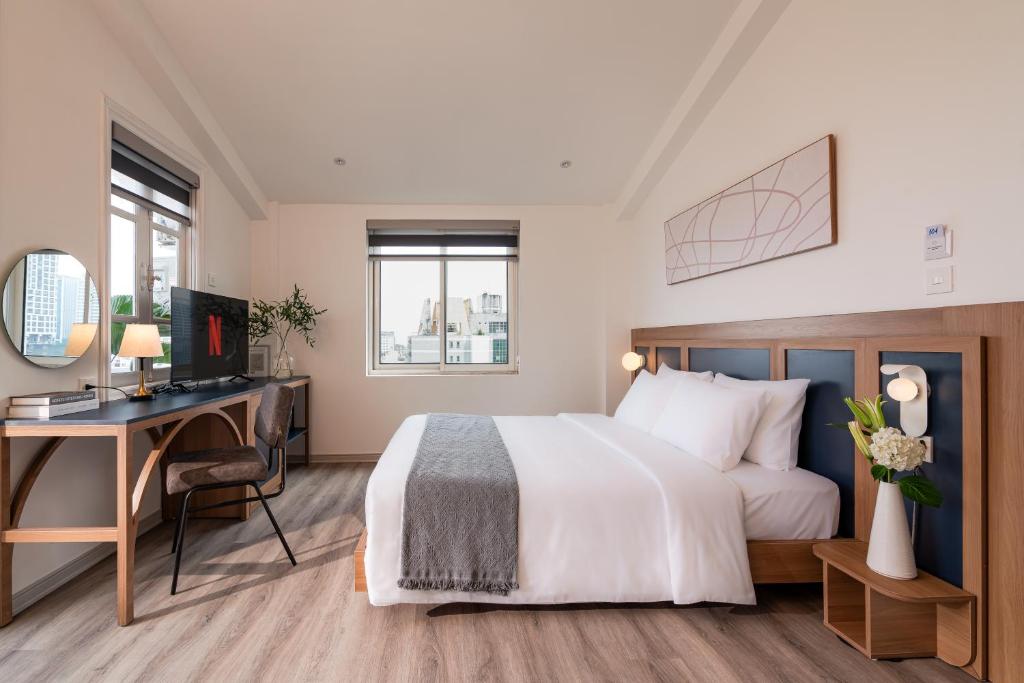 Voodi või voodid majutusasutuse Keypad Hotel - Linh Lang toas