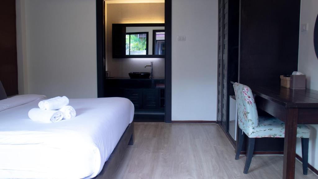 Postel nebo postele na pokoji v ubytování Chidlom Resort