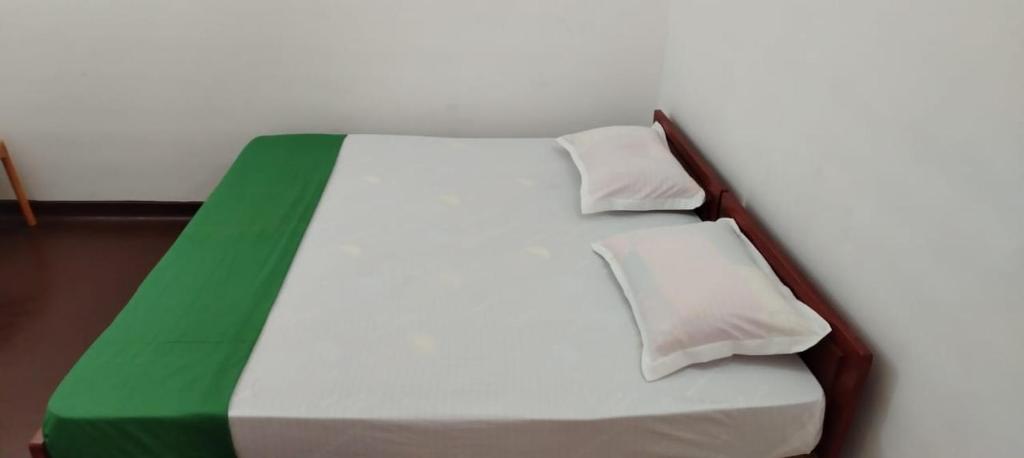 Postel nebo postele na pokoji v ubytování Hotel Lakeside
