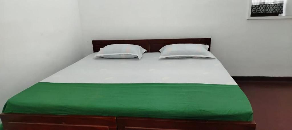 Postel nebo postele na pokoji v ubytování Hotel Lakeside
