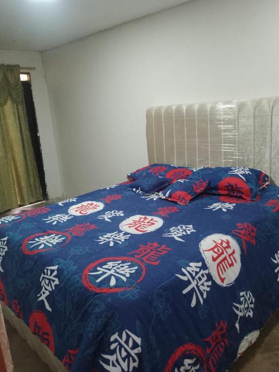 Postel nebo postele na pokoji v ubytování La Magdalena Hostel