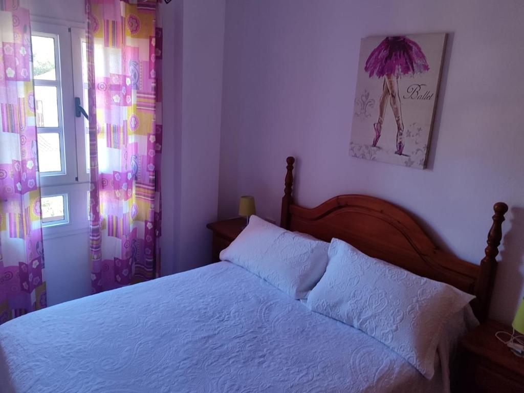 Postel nebo postele na pokoji v ubytování Casa Reyes Fataga
