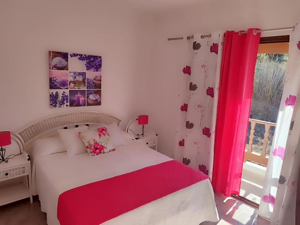 Postel nebo postele na pokoji v ubytování Casa Reyes Fataga
