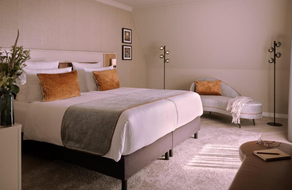 Postel nebo postele na pokoji v ubytování Leonardo Royal Hotel Baden- Baden