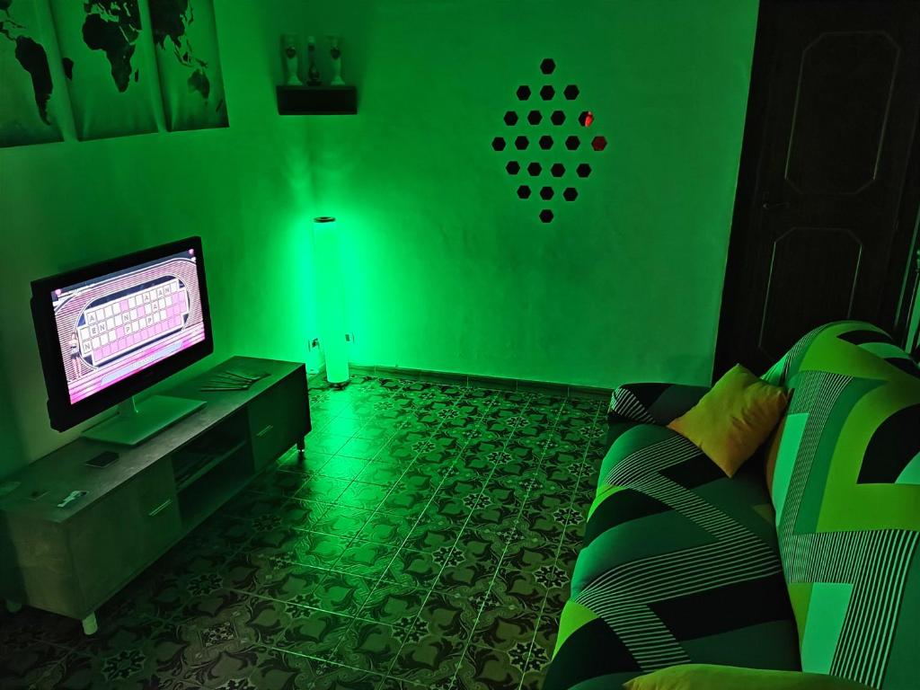TV a/nebo společenská místnost v ubytování Domus Aura