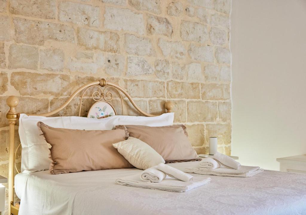 Postel nebo postele na pokoji v ubytování Casa Riscatto Suite