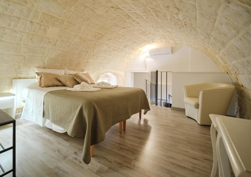 Postel nebo postele na pokoji v ubytování Casa Riscatto Suite