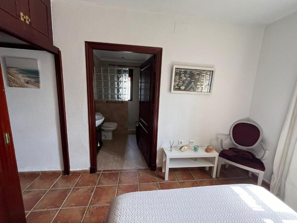 Łóżko lub łóżka w pokoju w obiekcie VILLA ANDEMAR