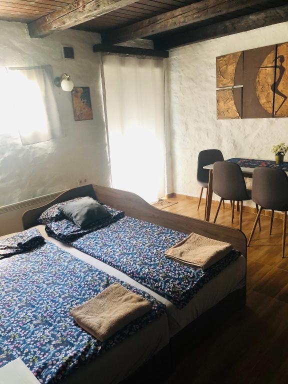 Postel nebo postele na pokoji v ubytování Lídia vendégház
