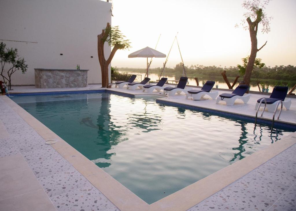 Bazén v ubytování Eyaru Palace Nile View nebo v jeho okolí