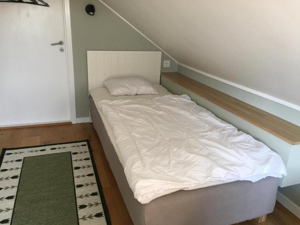 Postel nebo postele na pokoji v ubytování Mittes Rum