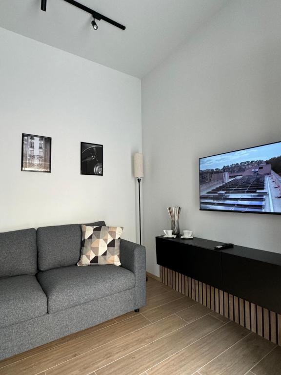 TV a/nebo společenská místnost v ubytování 48 Cadorna - Sostify