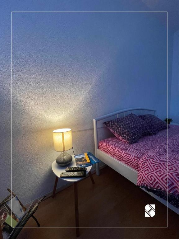 Postel nebo postele na pokoji v ubytování Sky Hostel