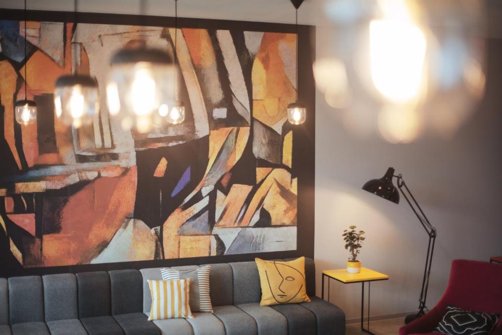 Zona d'estar a Holiday Inn - the niu, Form Stuttgart Feuerbach by IHG