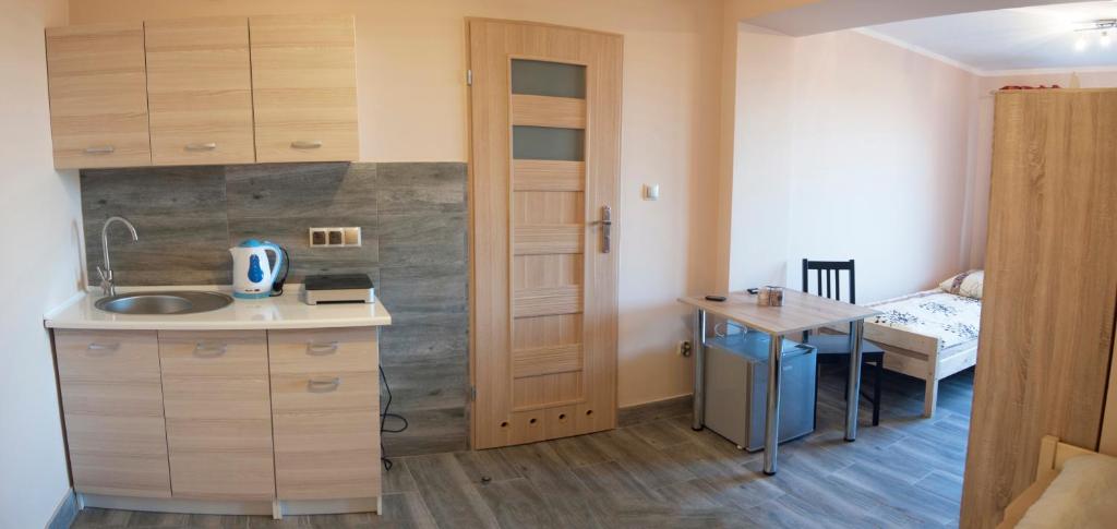 Kuchyňa alebo kuchynka v ubytovaní Villa 106