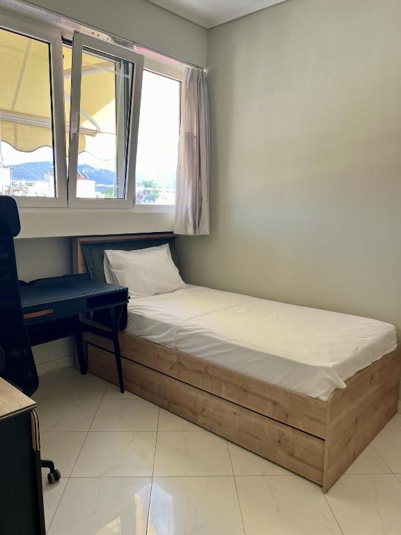 A bed or beds in a room at My Way Hotel