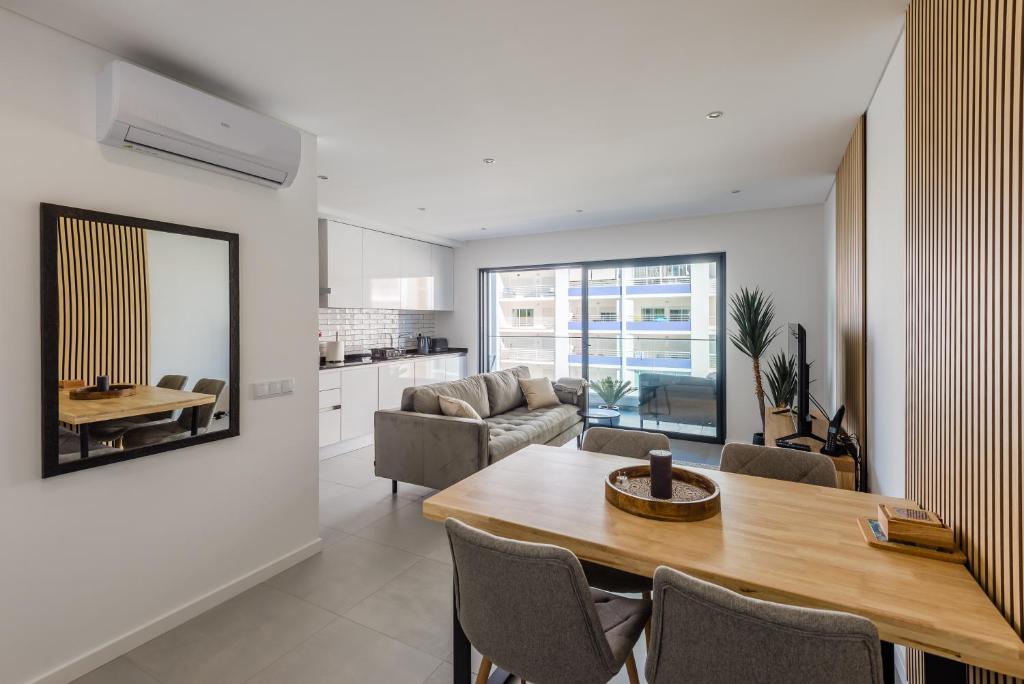 Posezení v ubytování Modern condo Praia da Rocha,Terracos Da Ciudade