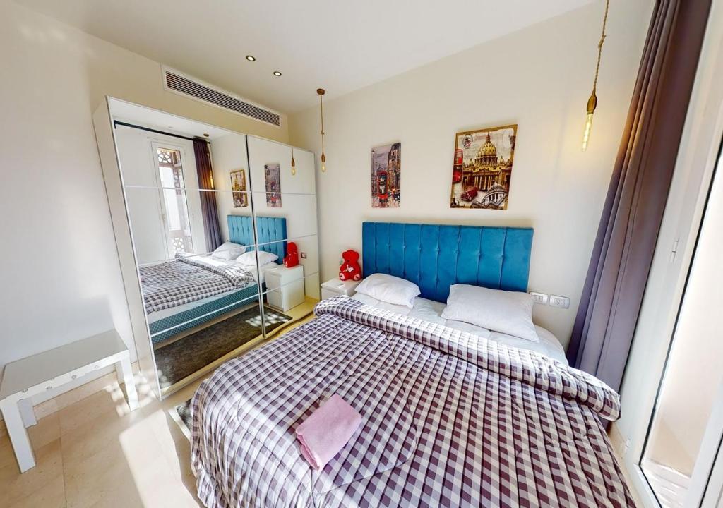 Postel nebo postele na pokoji v ubytování Cozy 2 Bedroom-WS3 at SCARAB Elgouna