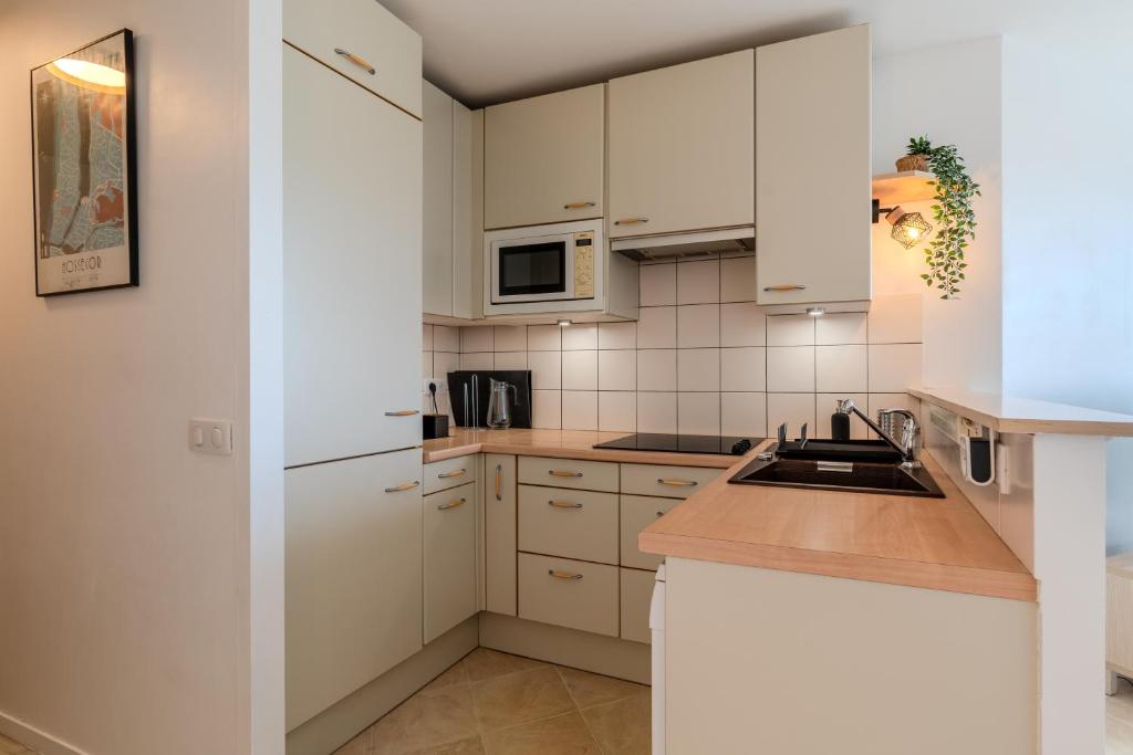 Una cocina o zona de cocina en Atlantic Selection - Vue Océan - La Sud Hossegor