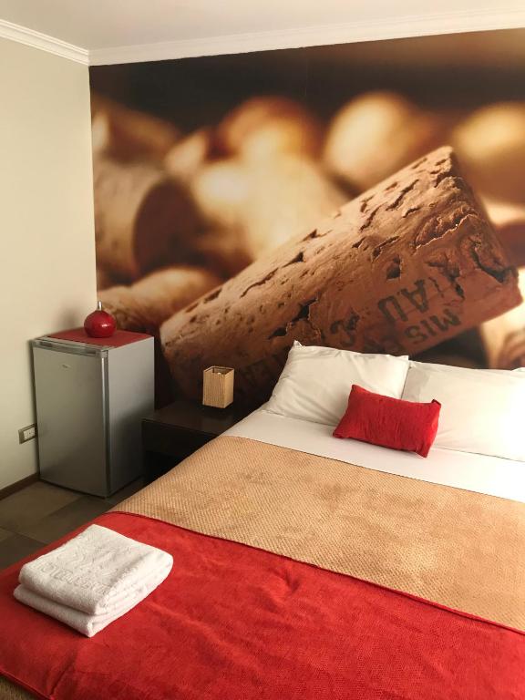 Una cama o camas en una habitación de Edificio Terravina