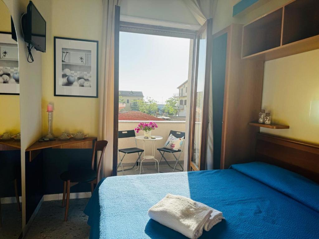 Postel nebo postele na pokoji v ubytování Hotel Praja Mare