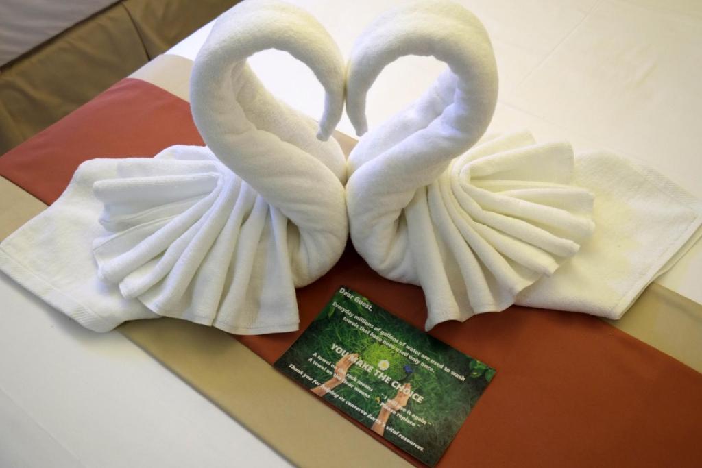 Posteľ alebo postele v izbe v ubytovaní Southpole Central Hotel