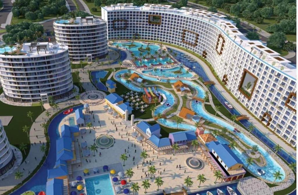 an aerial view of a water park at a resort at Porto golf Alamein in El Alamein