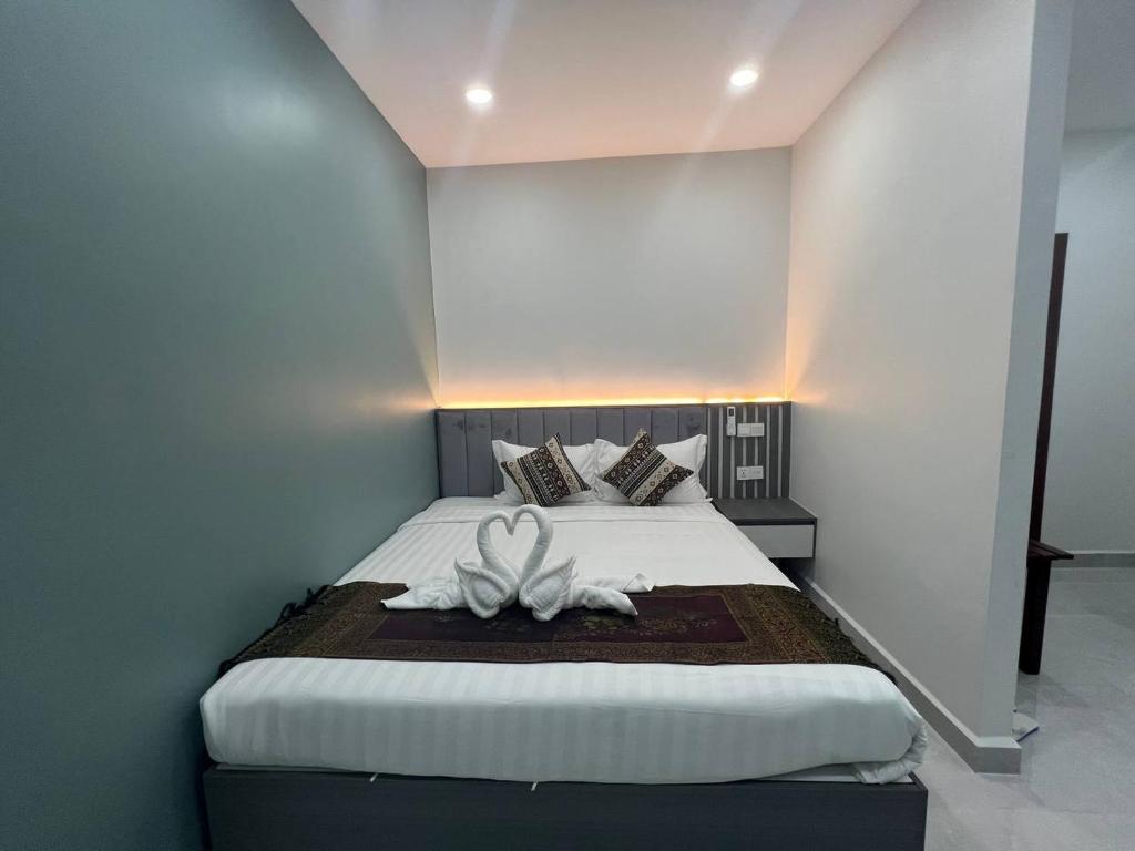 Postel nebo postele na pokoji v ubytování C-Hotel