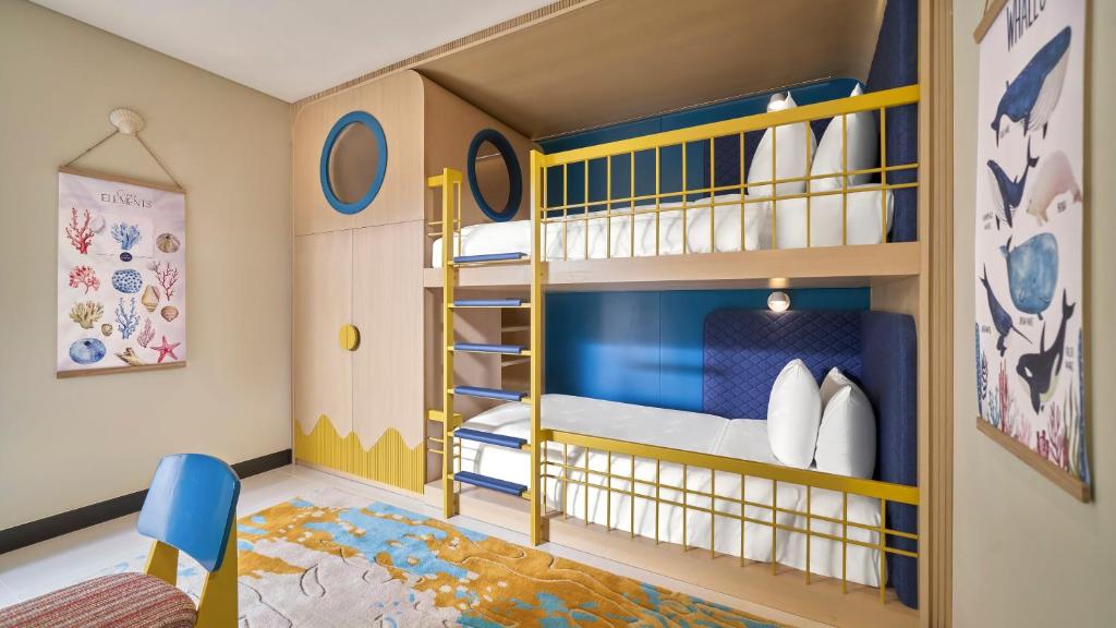 Two-Bedroom Suite with One King Bed, One Bunk Bed and Ocean View