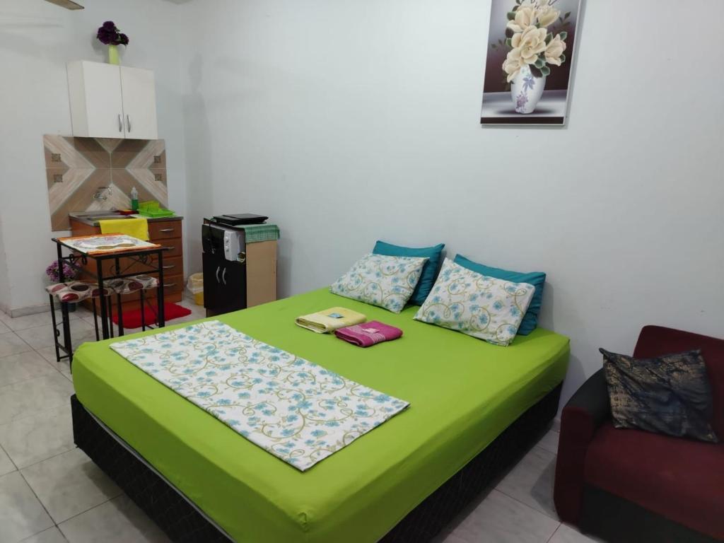 Voodi või voodid majutusasutuse Adorable monoambiente en Asunción toas