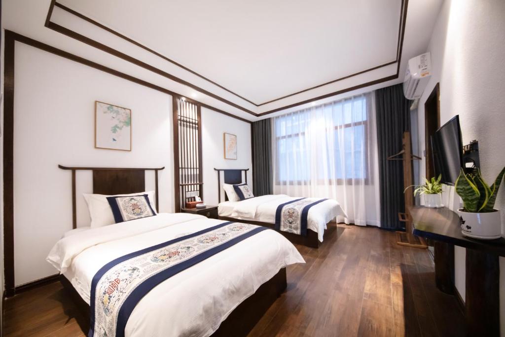 嬿栖居民宿凤凰古城店 - Doppelzimmer