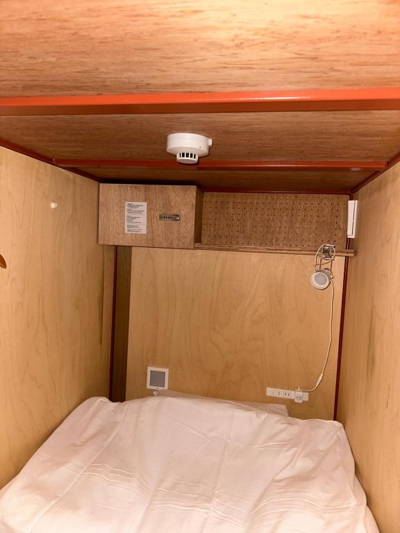 Voodi või voodid majutusasutuse WGJ Hostel toas
