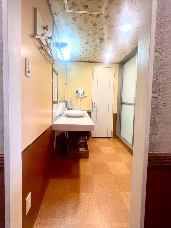 Koupelna v ubytování 富士Outlet温泉Hotel