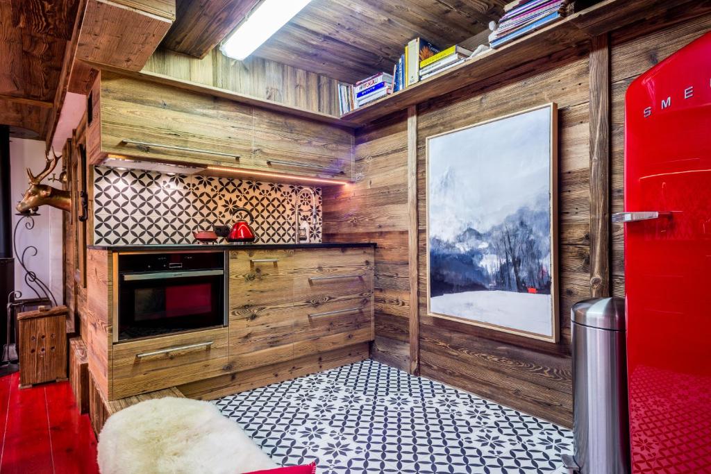 Kuchyň nebo kuchyňský kout v ubytování Chalet à Megève-Vauvray - Grands Appartements , vue Mont Blanc