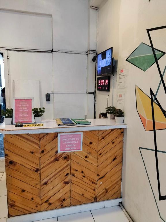 TV a/nebo společenská místnost v ubytování Dormitels.ph Ermita