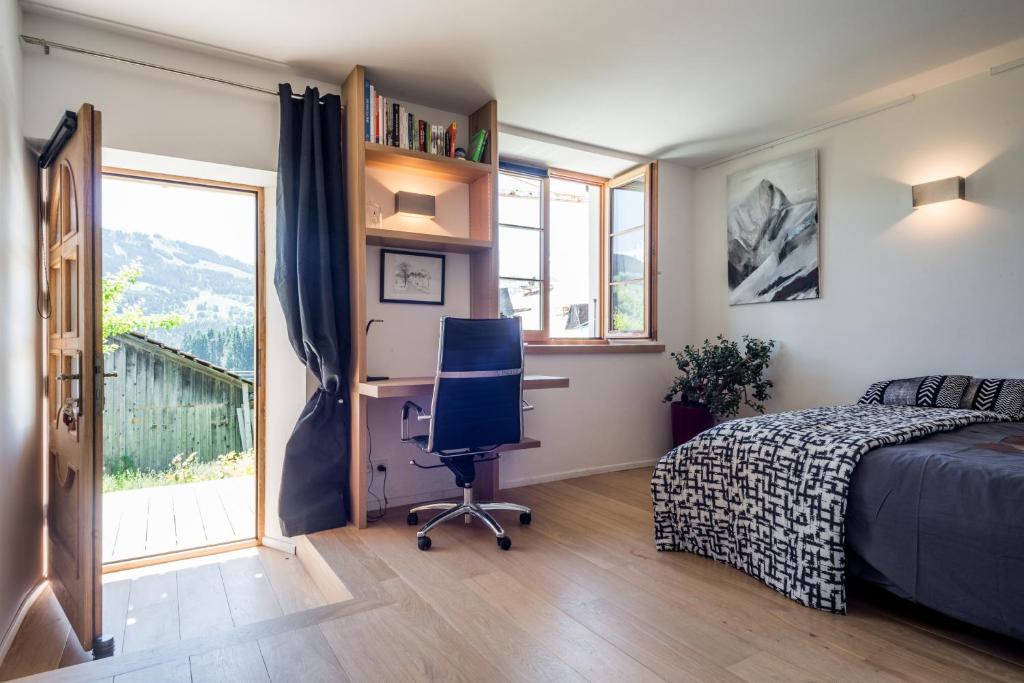 Postel nebo postele na pokoji v ubytování Chalet à Megève-Vauvray - Grands Appartements , vue Mont Blanc